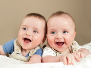 Smiling happy twin boys